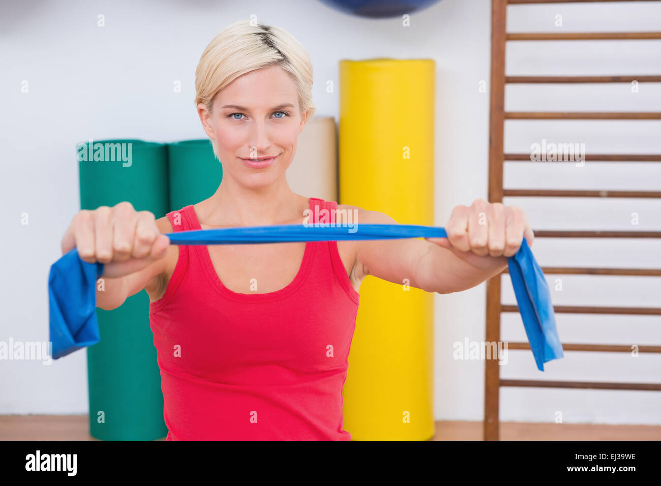 Blonde woman stretching hi-res stock photography and images - Alamy