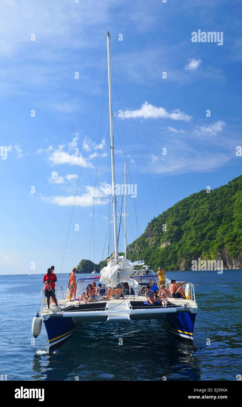 FORT-DE-FRANCE, MARTINIQUE: Tourists sail in luxurious catamaran across the Caribbean sea Stock Photo