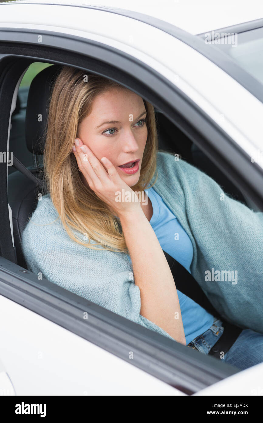 Surprised young woman Stock Photo - Alamy