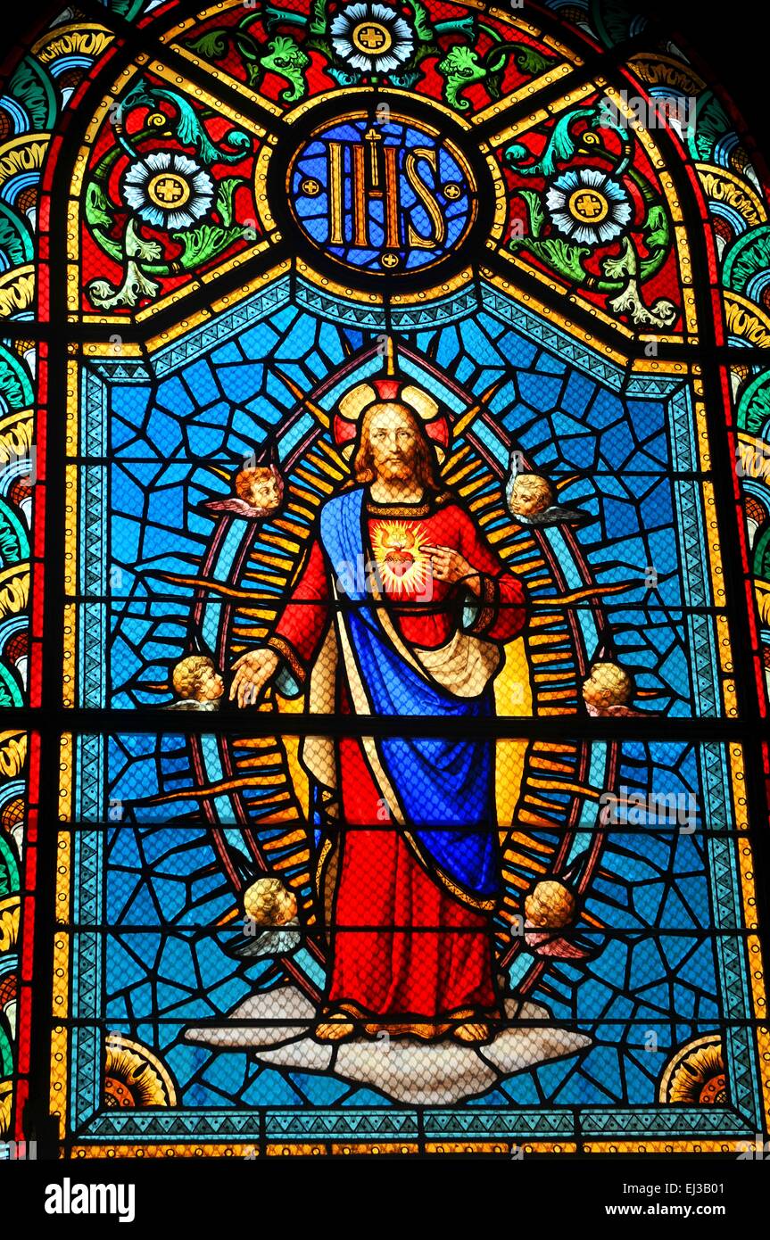 Stained Glass Window Depicting Sacred Heart Of Jesus In Medieval Church Stock Photo Alamy