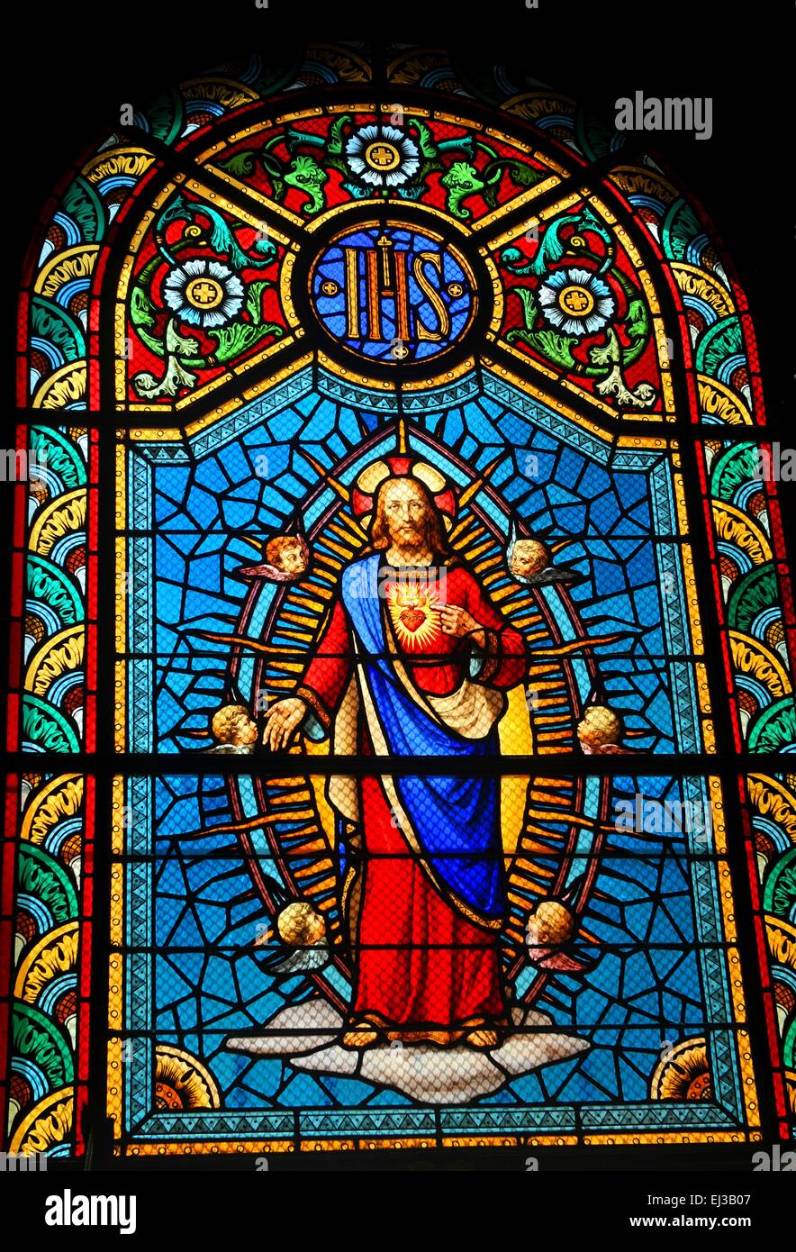 Stained glass window depicting Sacred Heart of Jesus in medieval church  Stock Photo - Alamy