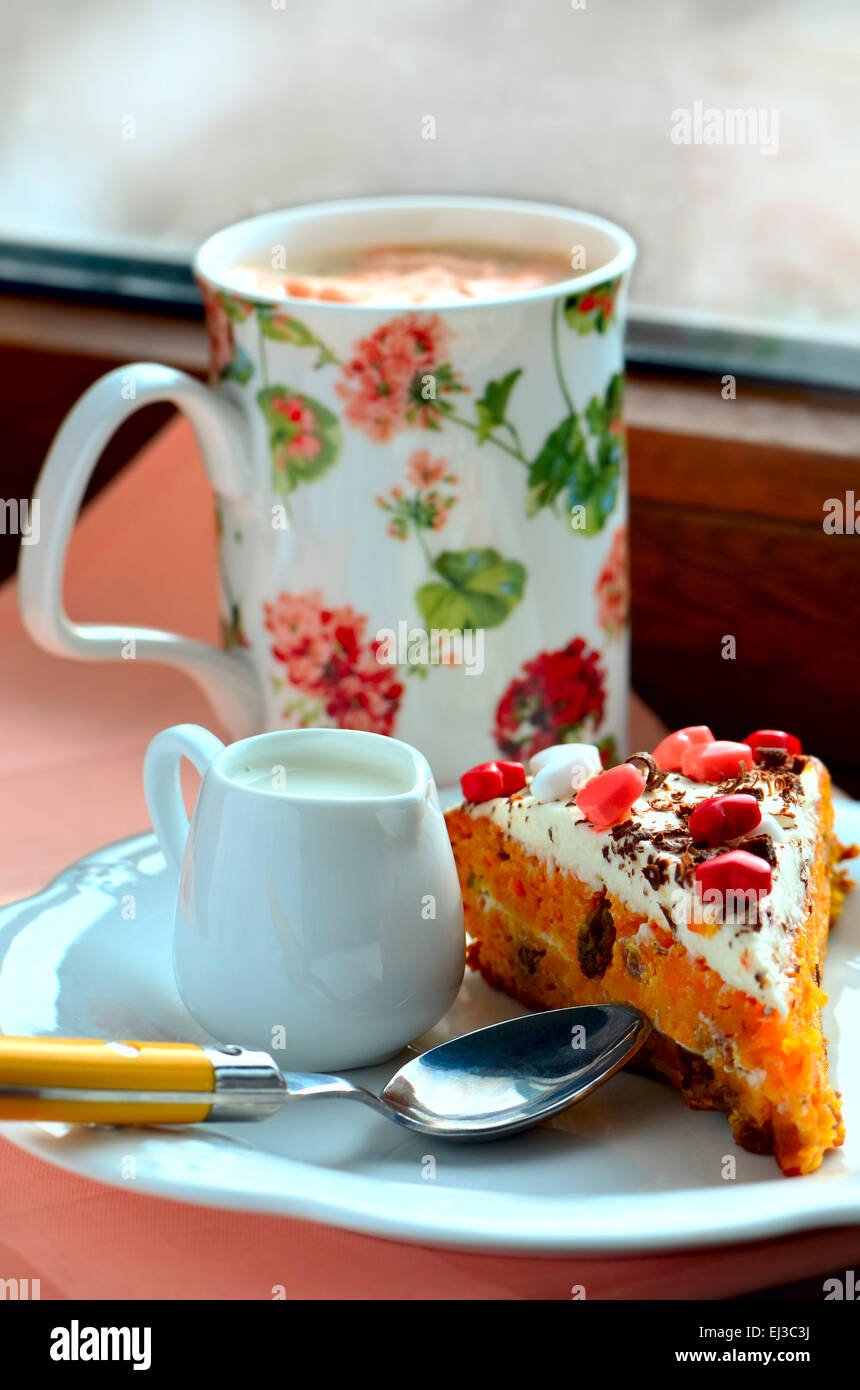 Carrot cake and marshmallow decaffeinated coffee Stock Photo