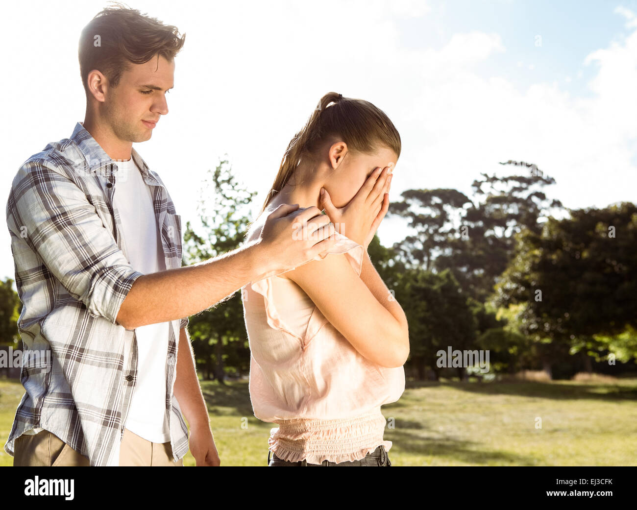 Couple after an argument in the park Stock Photo - Alamy