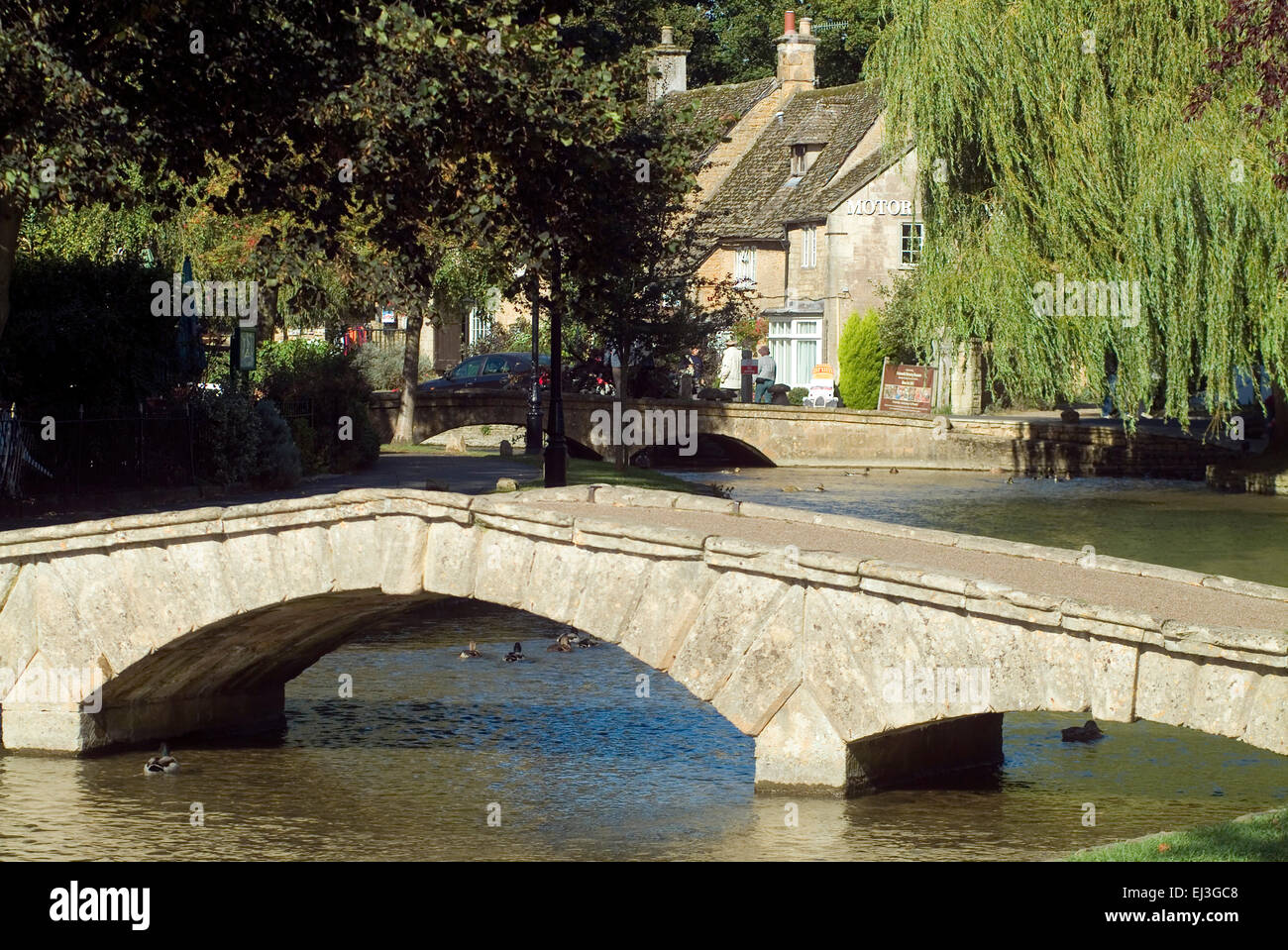 Old Stone bridge over River Windrush  in Bourton on the water Cotswolds Gloucestershire England UK Europe Stock Photo