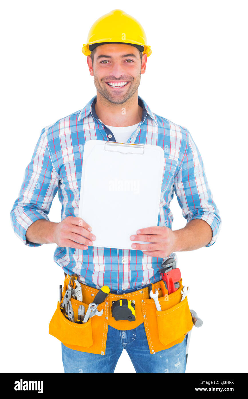 Shutterhand Worker Portrait of smiling manual worker holding clipboard Stock Photo - Alamy