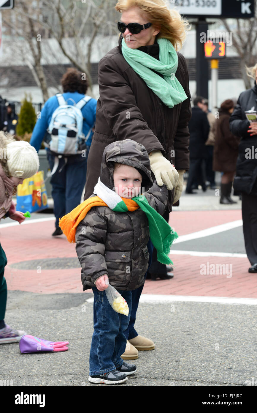 Little boy not happy during the 2013 St. Patrick's Day Parade in Newark, New Jersey. USA Stock Photo