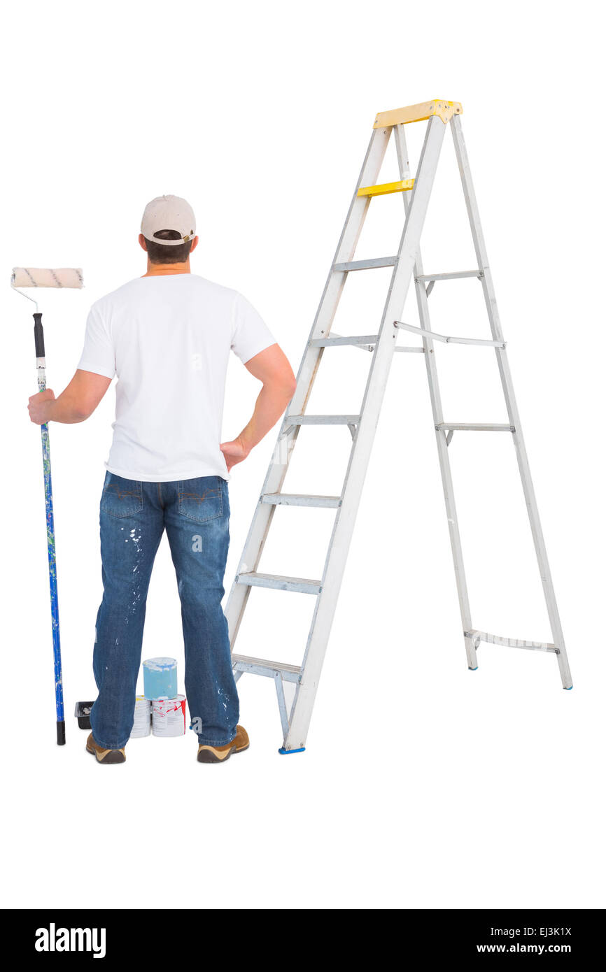 handyman with paint roller and ladder Stock Photo Alamy