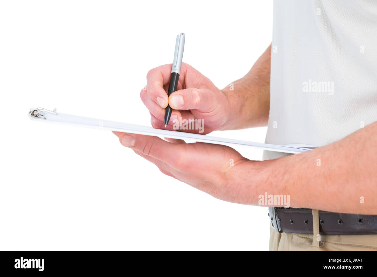 Delivery man writing on clipboard Stock Photo - Alamy