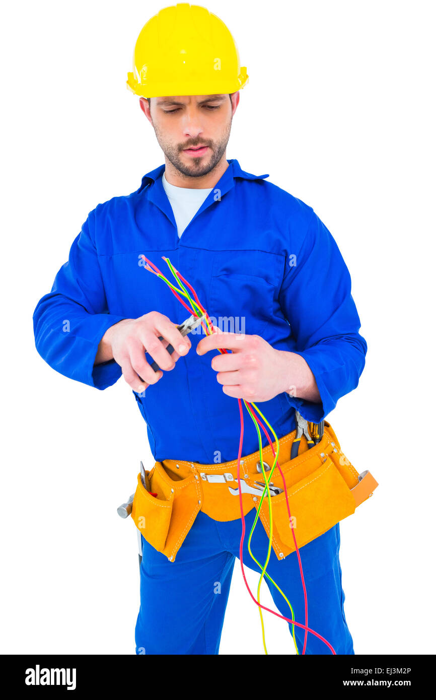 Electrician cutting wire with pliers Stock Photo - Alamy