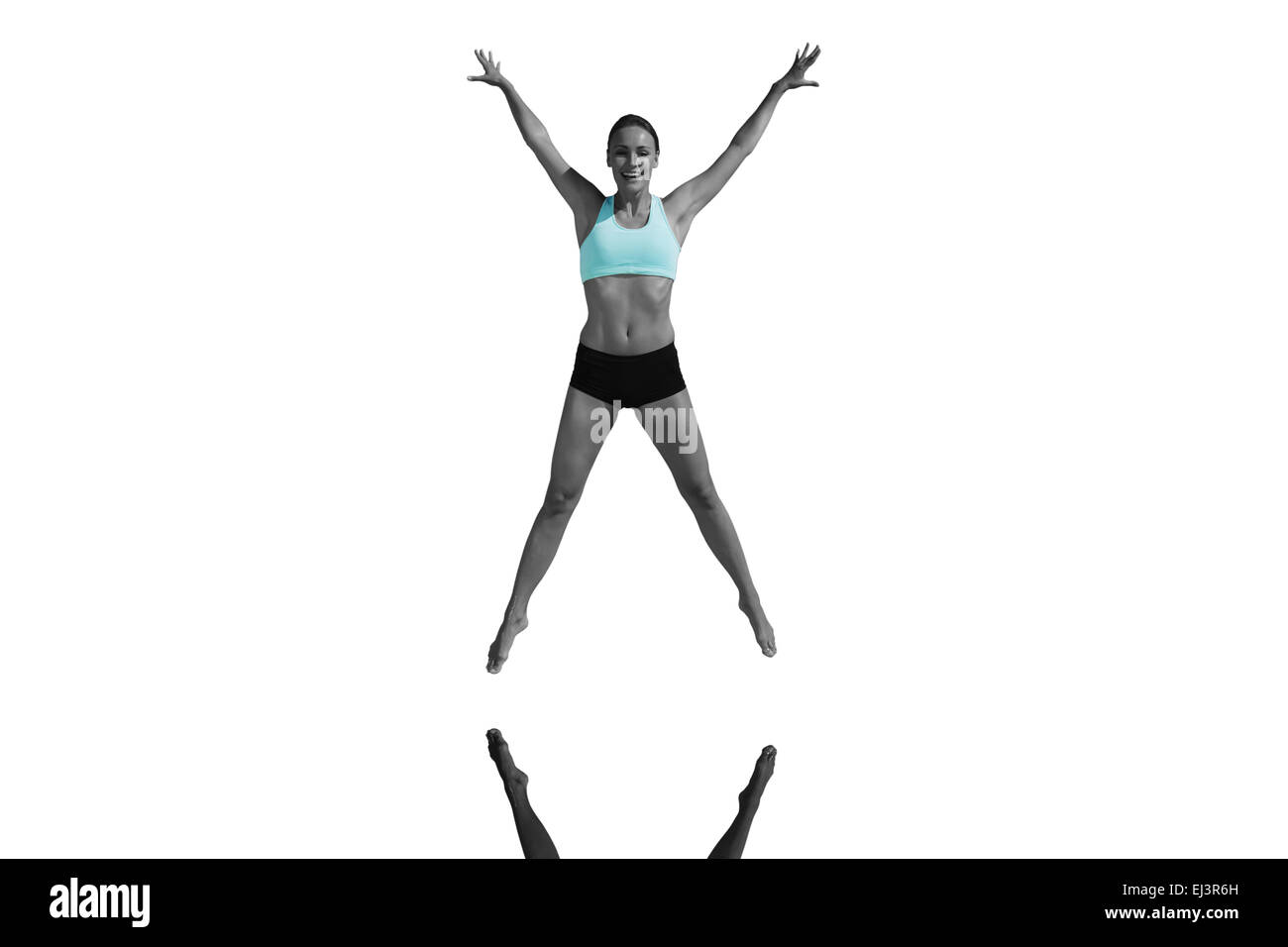 Fit woman jumping hi-res stock photography and images - Alamy