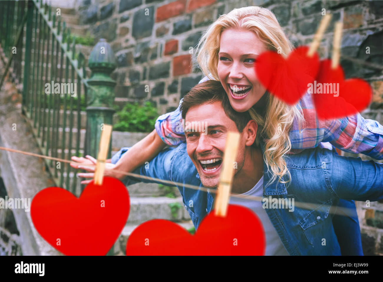 Composite image of hip young couple having fun Stock Photo - Alamy