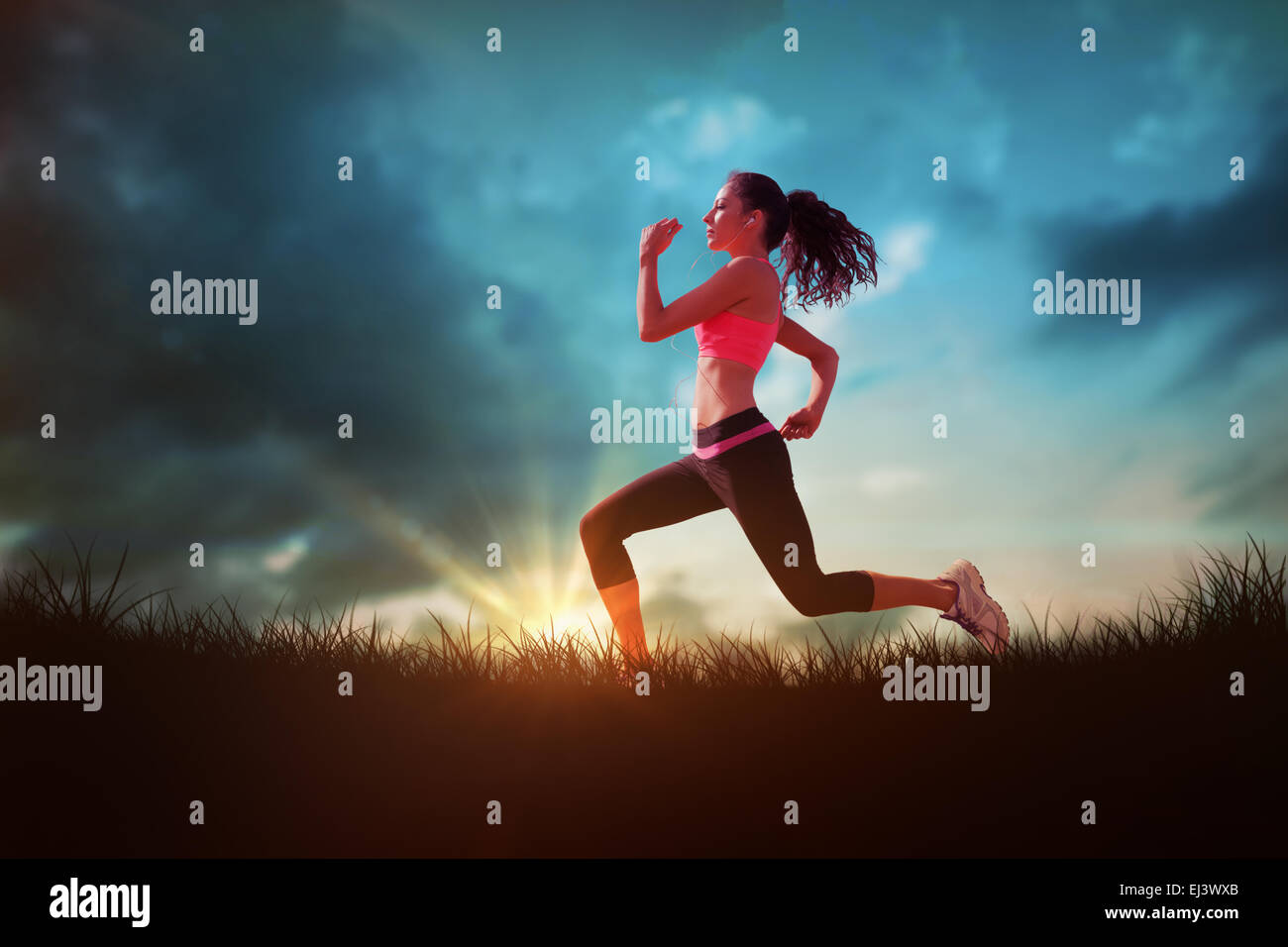 Composite image of full length of healthy woman jogging Stock Photo