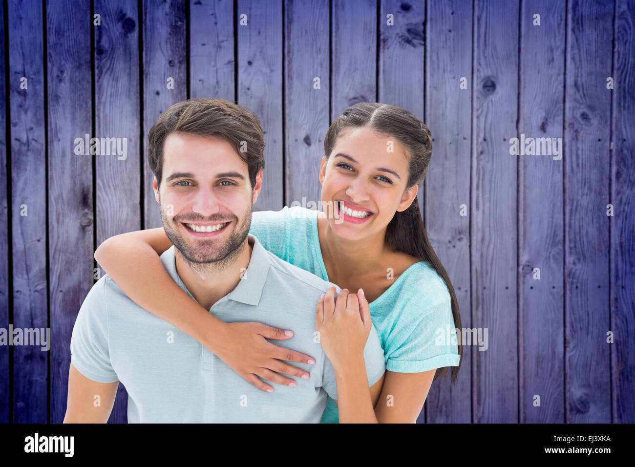 Composite image of cute couple smiling at camera Stock Photo