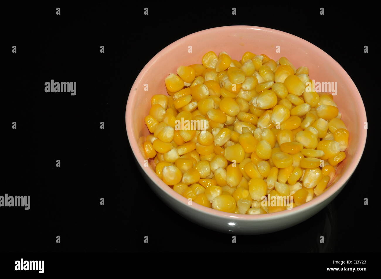 steamed sweet corns served in the big bowls Stock Photo