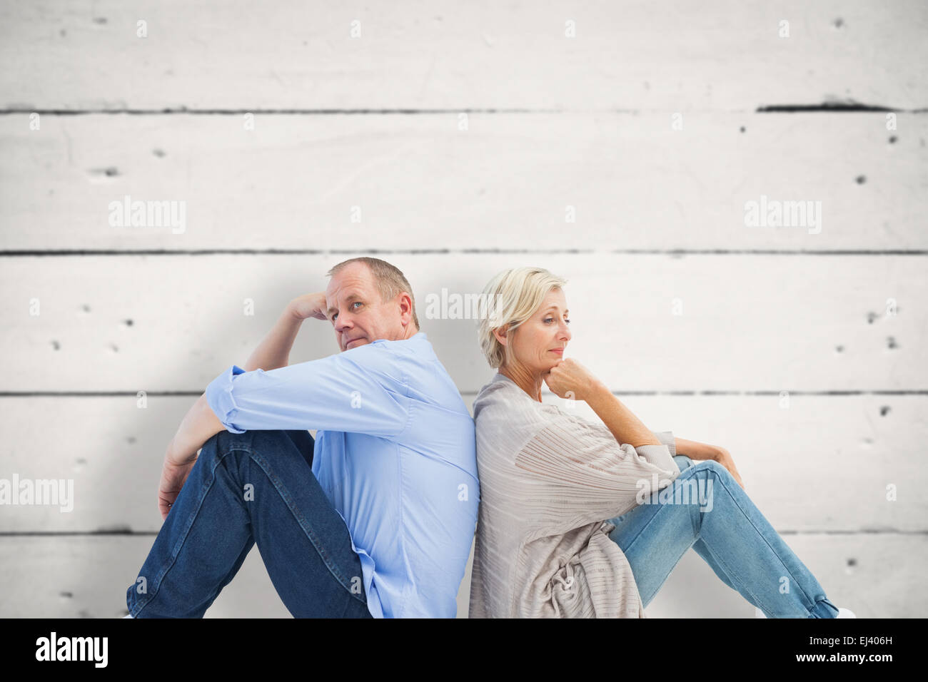 Composite image of upset mature couple not talking Stock Photo