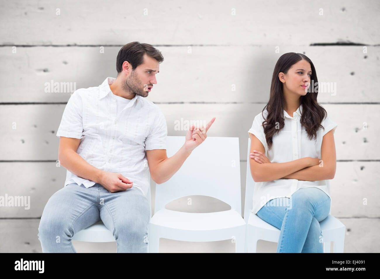 Composite image of man pleading with angry girlfriend Stock Photo