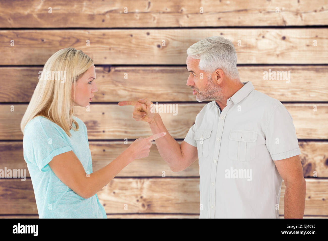 Composite image of unhappy couple having an argument Stock Photo - Alamy
