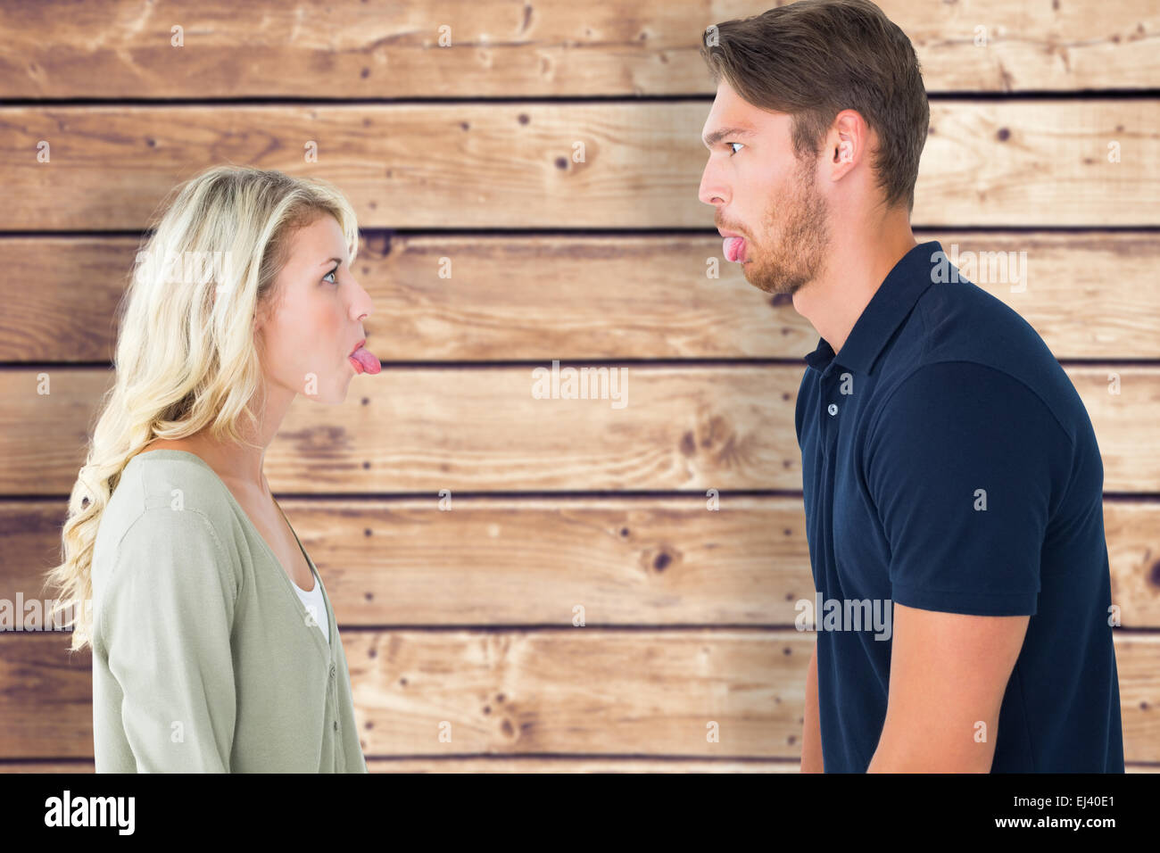 Composite image of childish couple having an argument Stock Photo