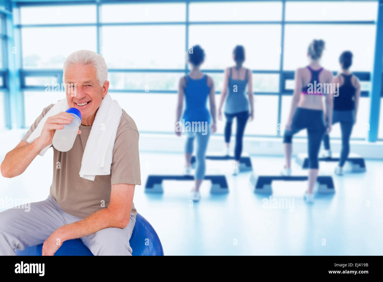 Senior man drinking from water bottle Stock Photo Alamy