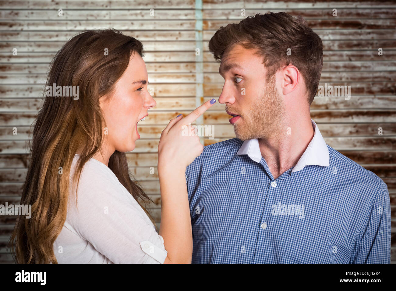 Composite image of casual young couple in an argument Stock Photo