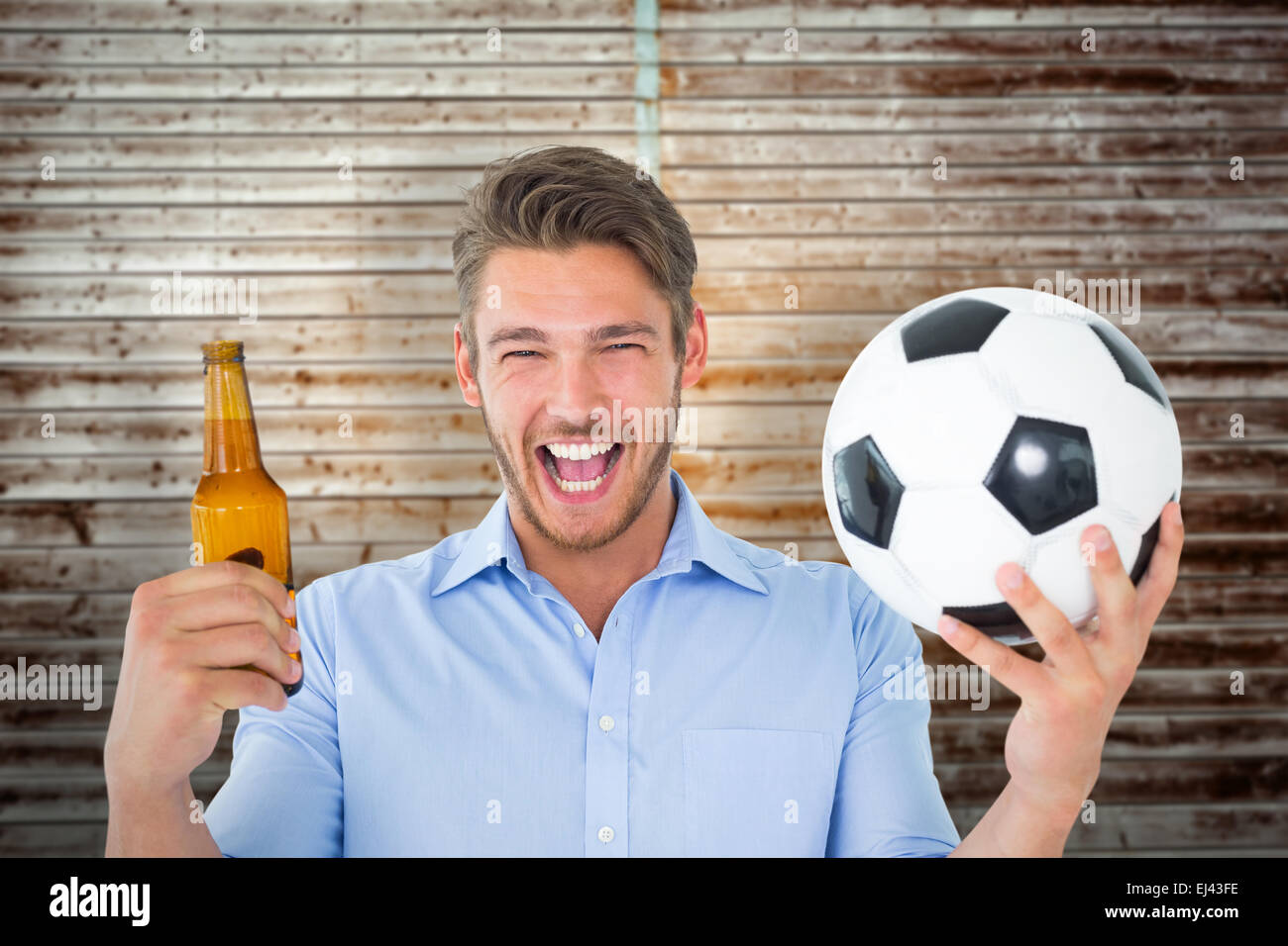 Composite image of handsome young man holding ball and beer Stock Photo