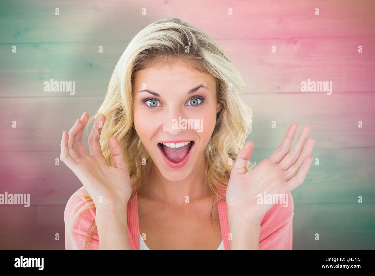 Composite image of pretty young blonde feeling surprised Stock Photo
