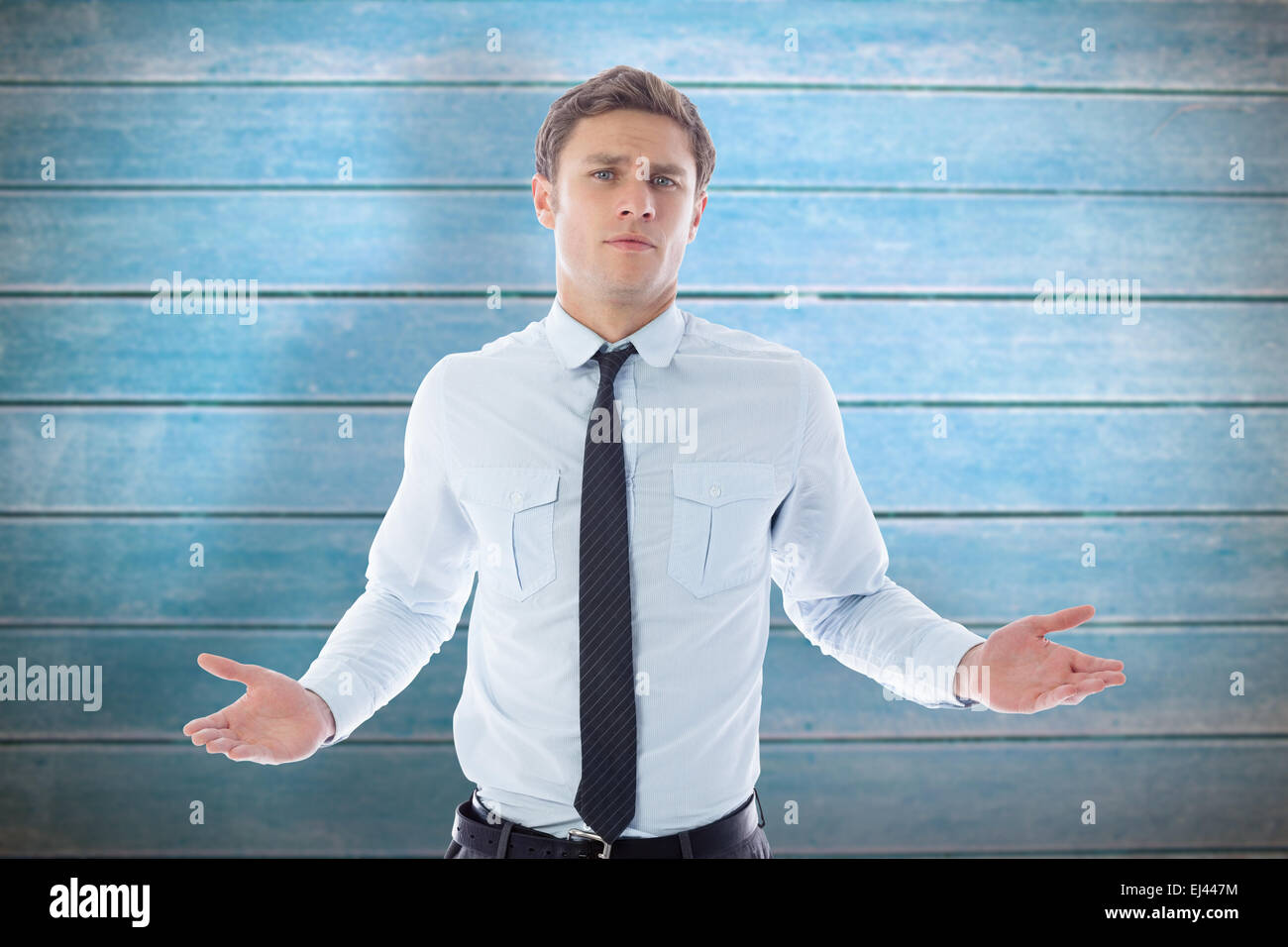 Composite image of puzzled businessman Stock Photo