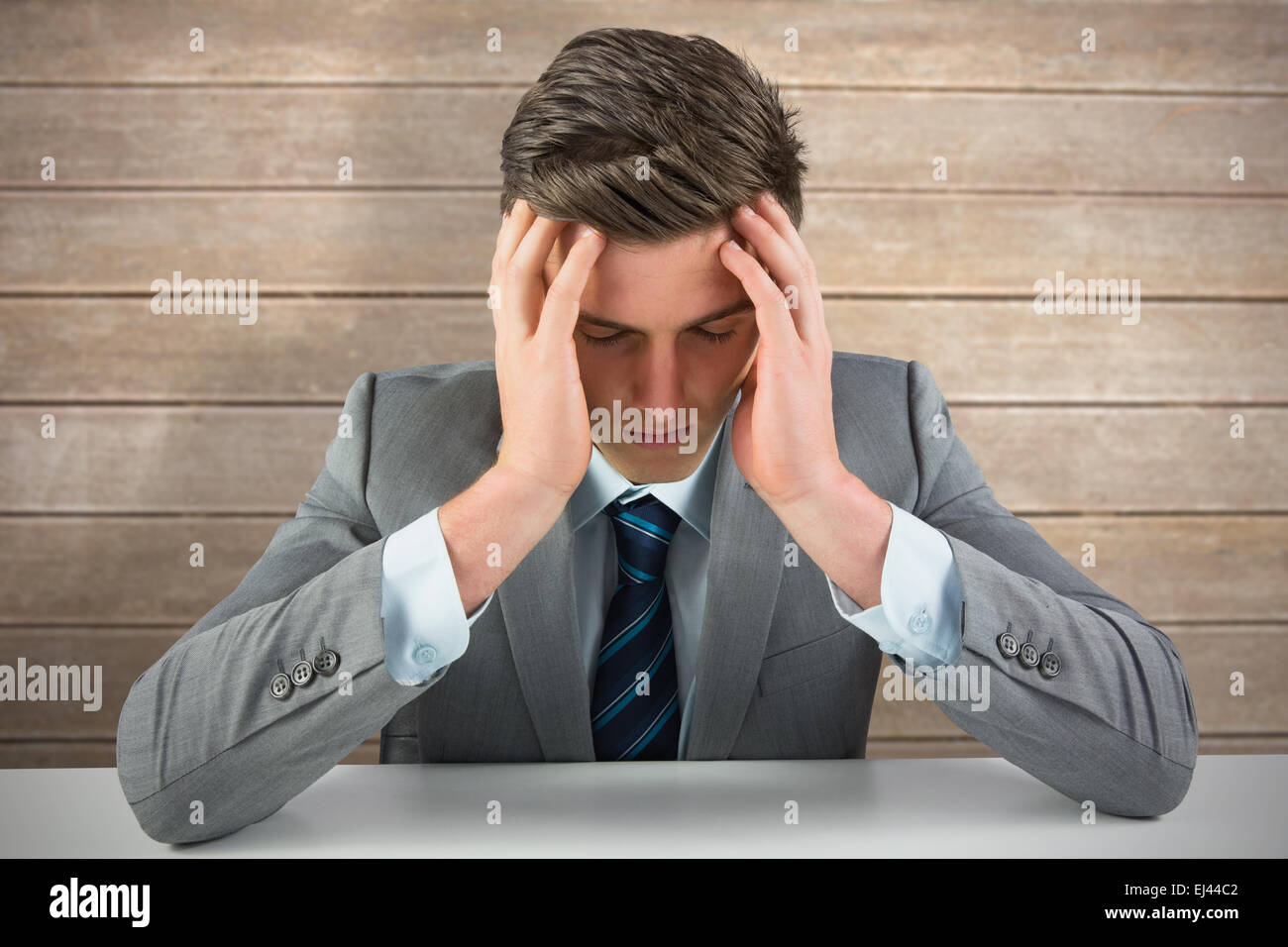 Composite image of anxious businessman Stock Photo