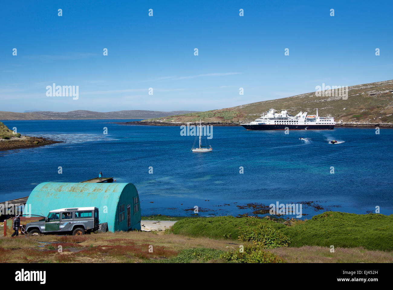 Farm estate with moored cruise ship West Point Island Falkland Islands