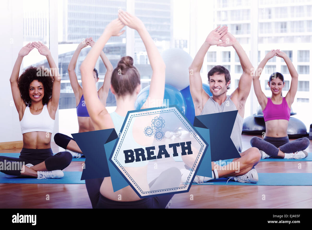 The word breath and people with trainer doing stretching exercises Stock Photo