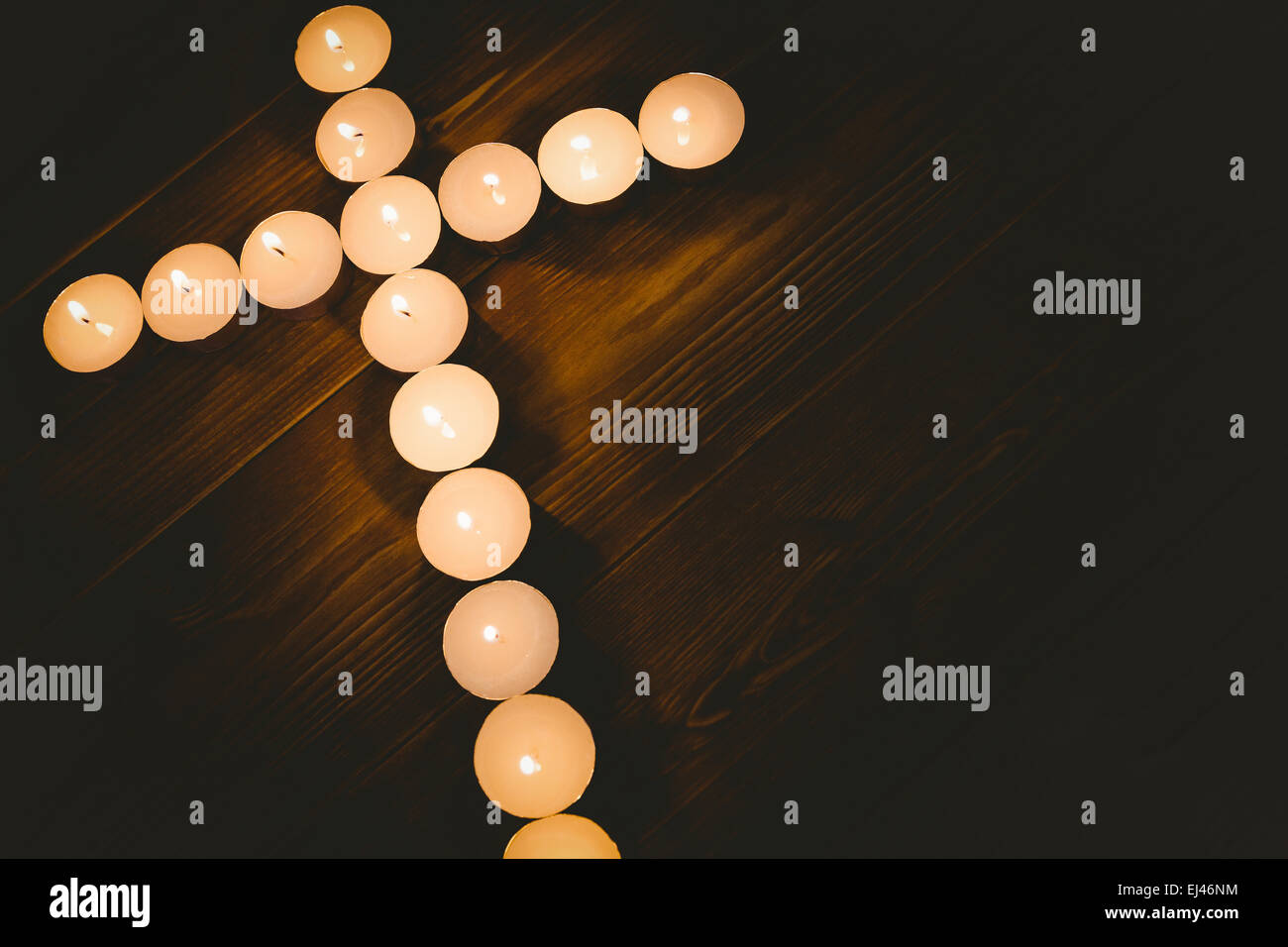 Candles in shape of cross Stock Photo Alamy