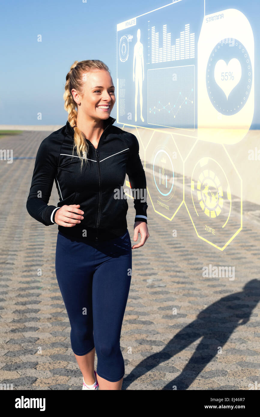Young blonde woman with ponytail jogging in autumn forest Stock Photo -  Alamy
