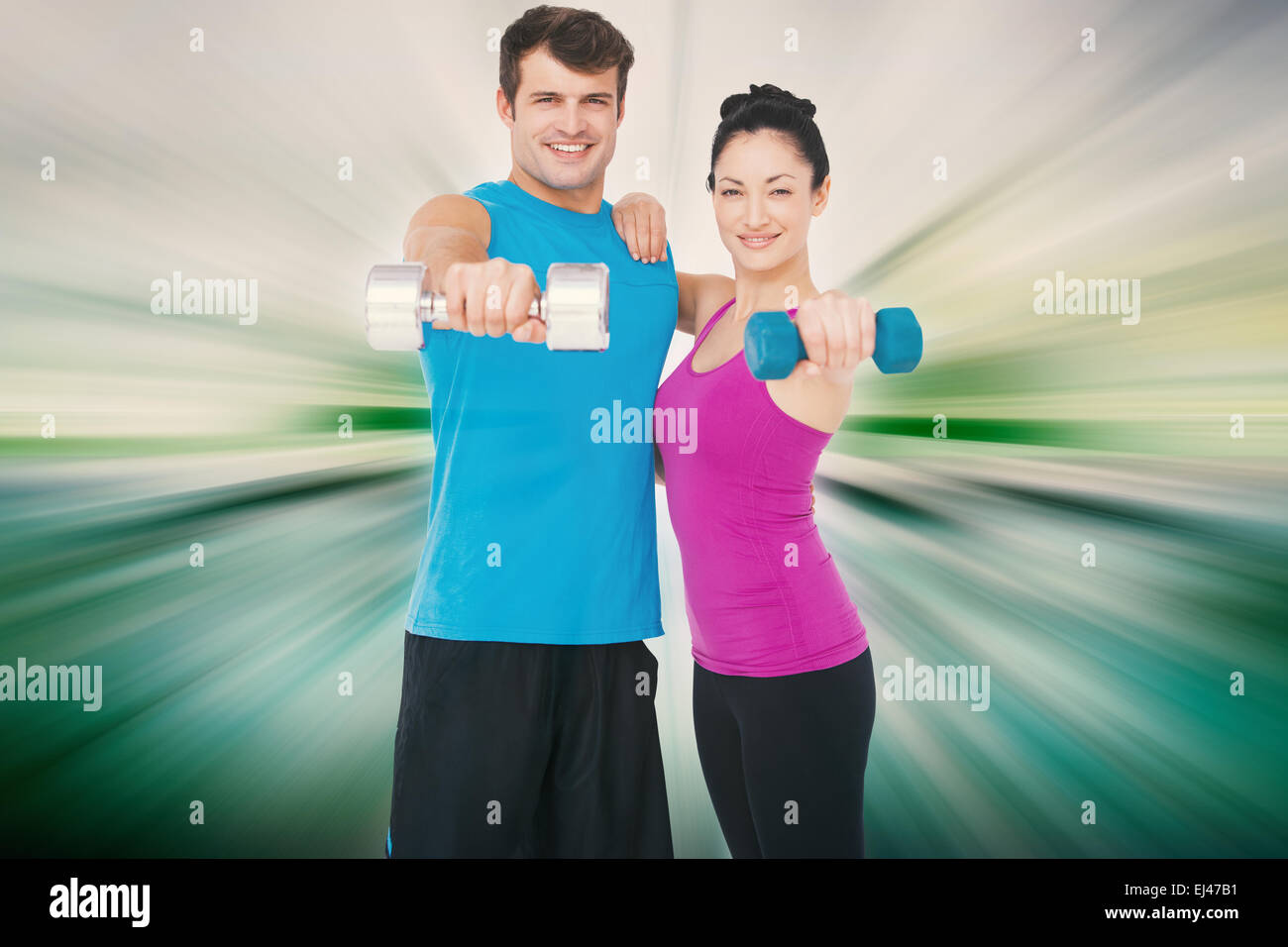 Composite image of fit man and woman lifting dumbbells Stock Photo - Alamy