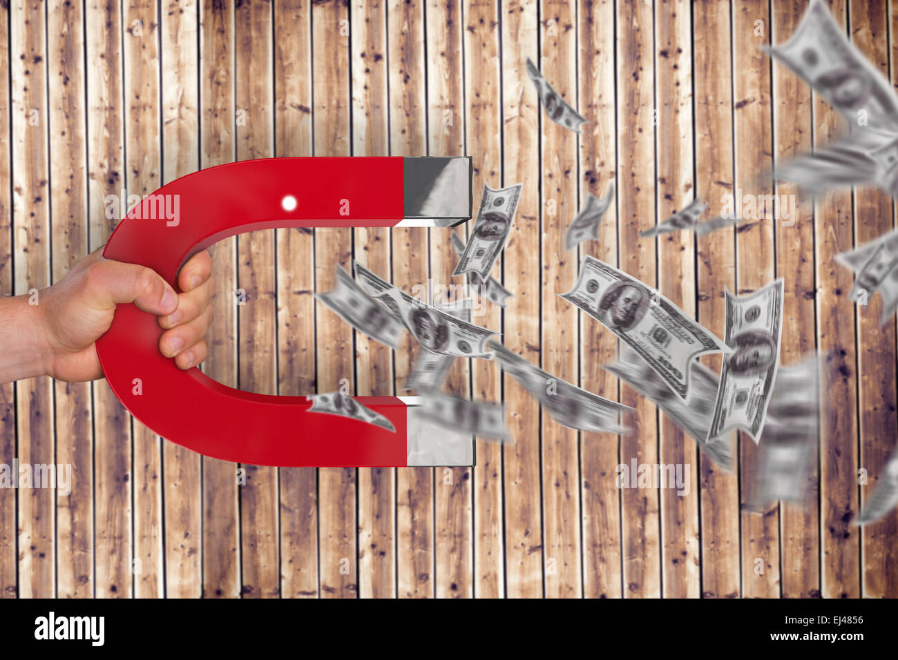 Composite image of magnet attracting dollars Stock Photo
