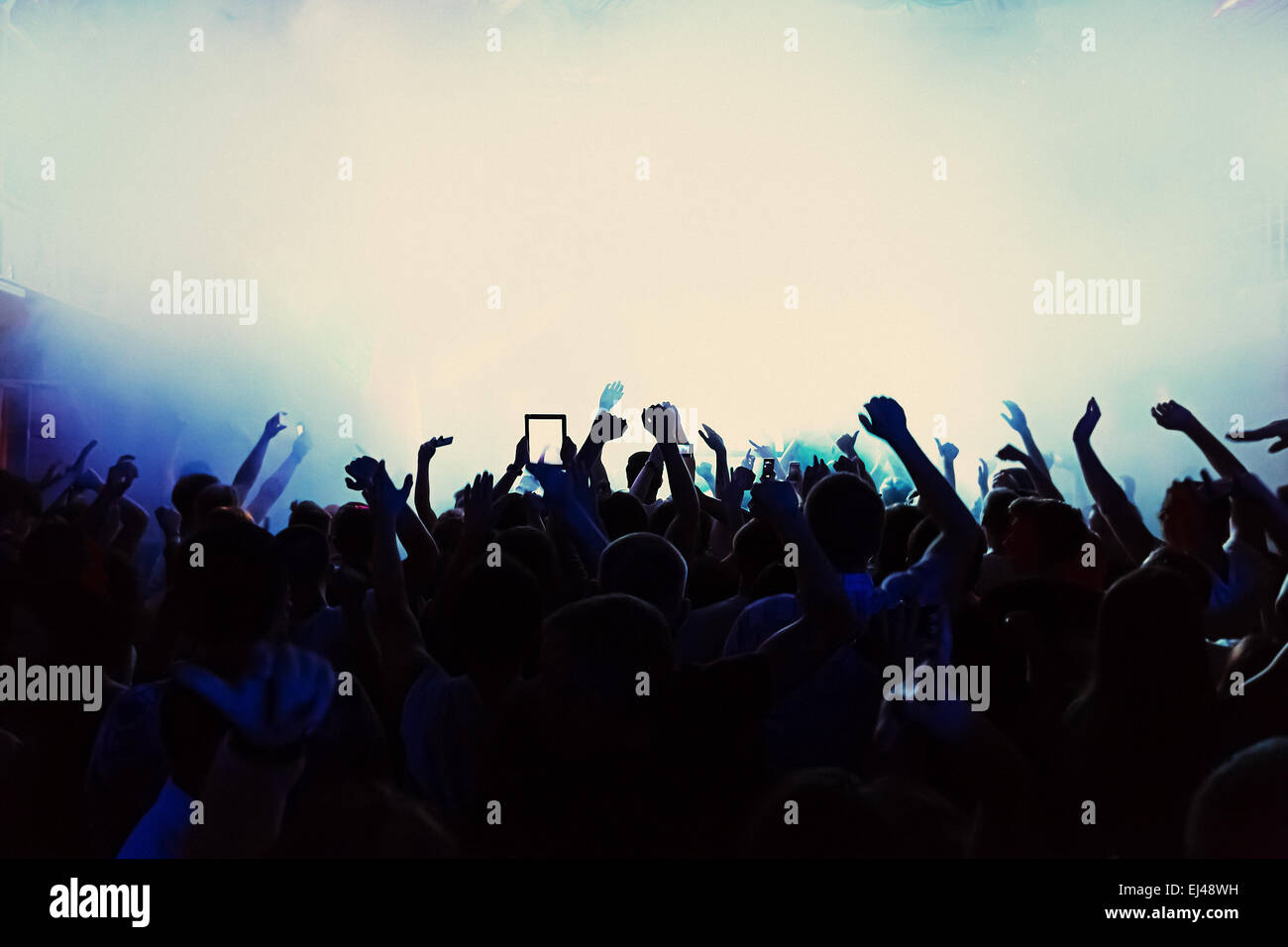 silhouettes of a crowd party concert music happy Stock Photo