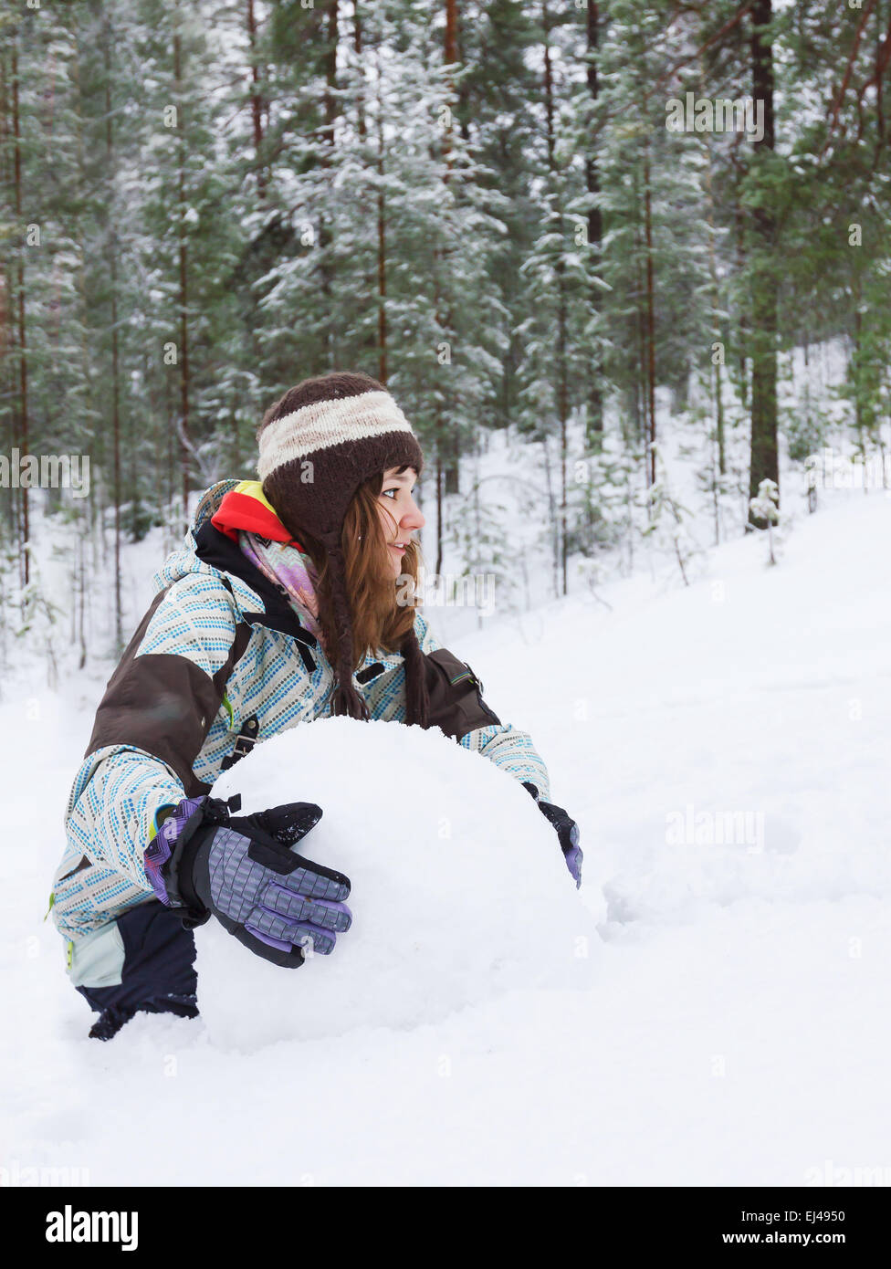woman have fun in winter snowy forest outdoors Stock Photo
