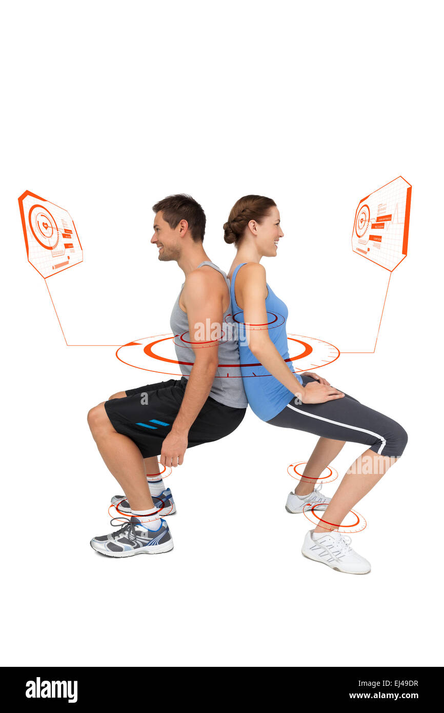 Composite image of side view of a fit young couple doing squats Stock Photo