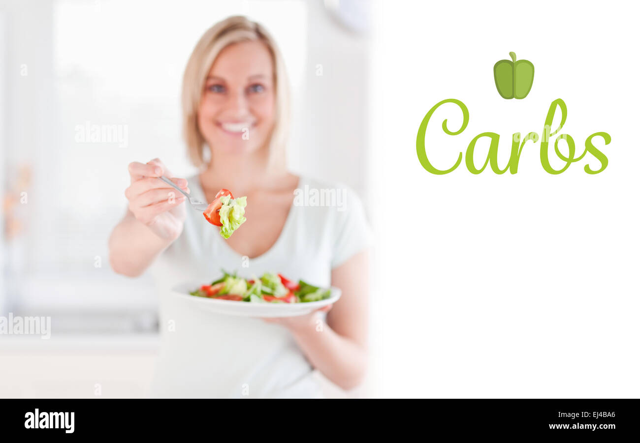 Carbs against woman offering salad Stock Photo