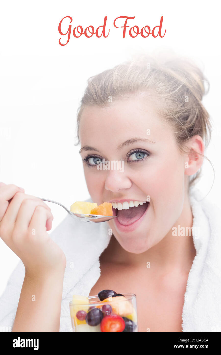Good food against woman eating fruit Stock Photo Alamy