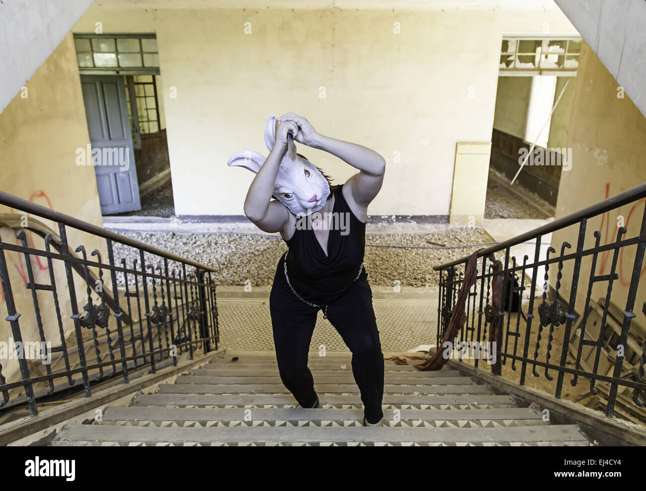 Stairs killer rabbit mask, halloween Stock Photo Alamy