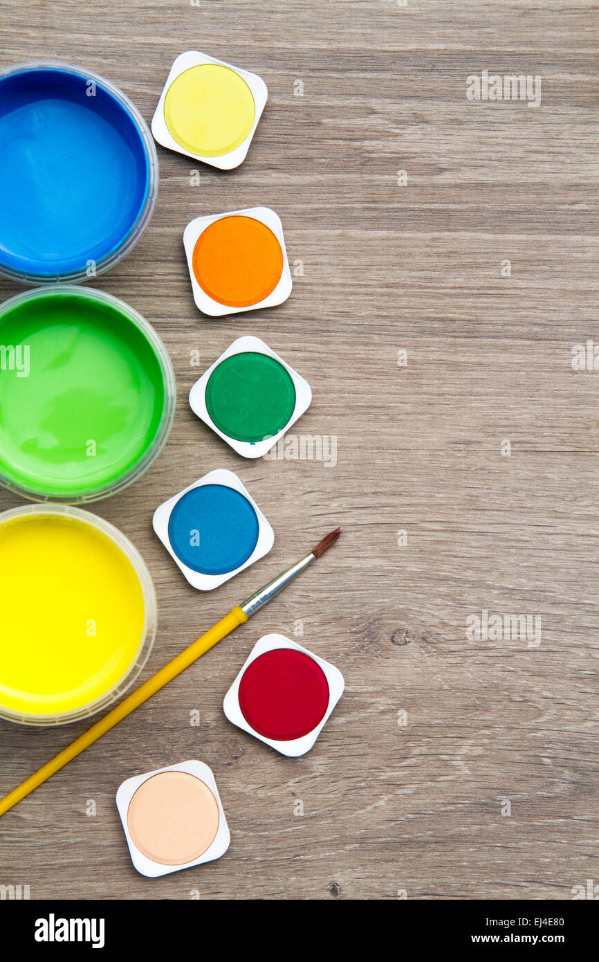 watercolors and tempera in wooden background Stock Photo Alamy