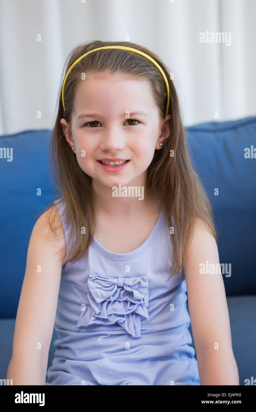 Little girl smiling at camera Stock Photo - Alamy