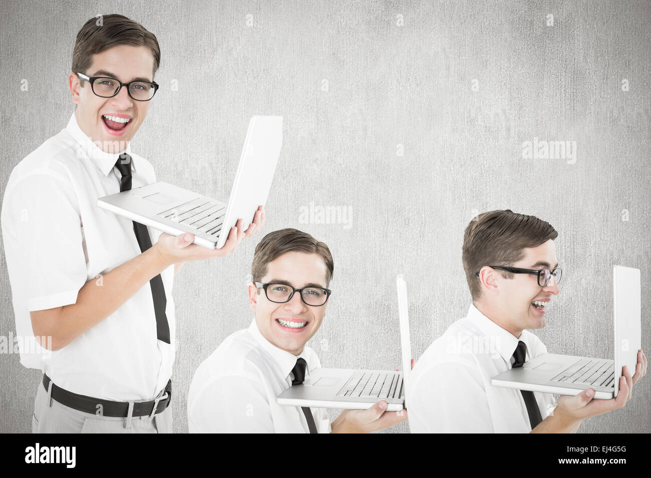 Composite image of nerd with laptop Stock Photo - Alamy