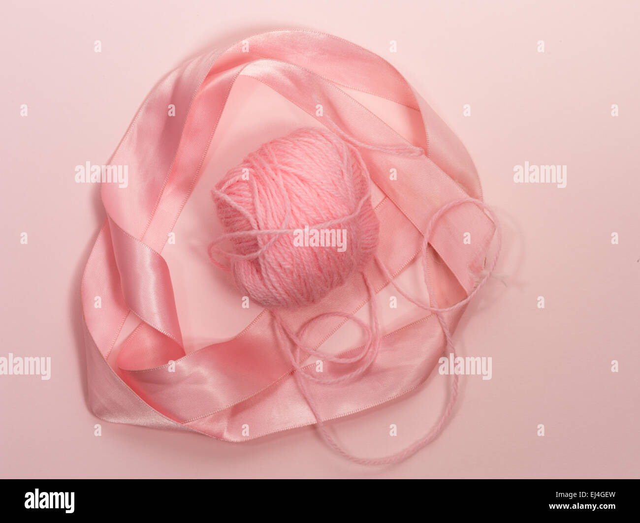 pink wool and ribbon Stock Photo Alamy