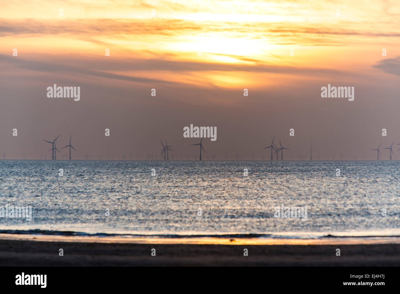 Egmond aan Zee, North Holland, Netherlands, off shore wind park, 18 kilometers of the coast, sunset Stock Photo