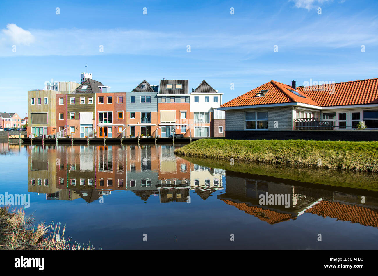 Living on the water, new buildings in the district Nieuw Den Helder, North Holland, houses directly on artificial channels, Stock Photo