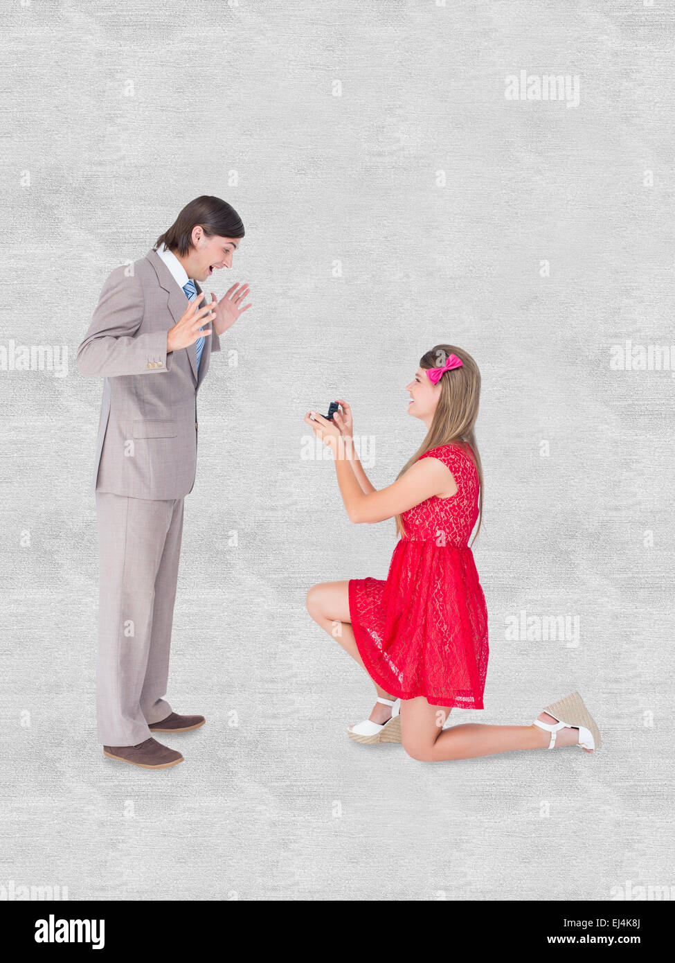 Composite image of pretty hipster on bended knee doing a marriage ...
