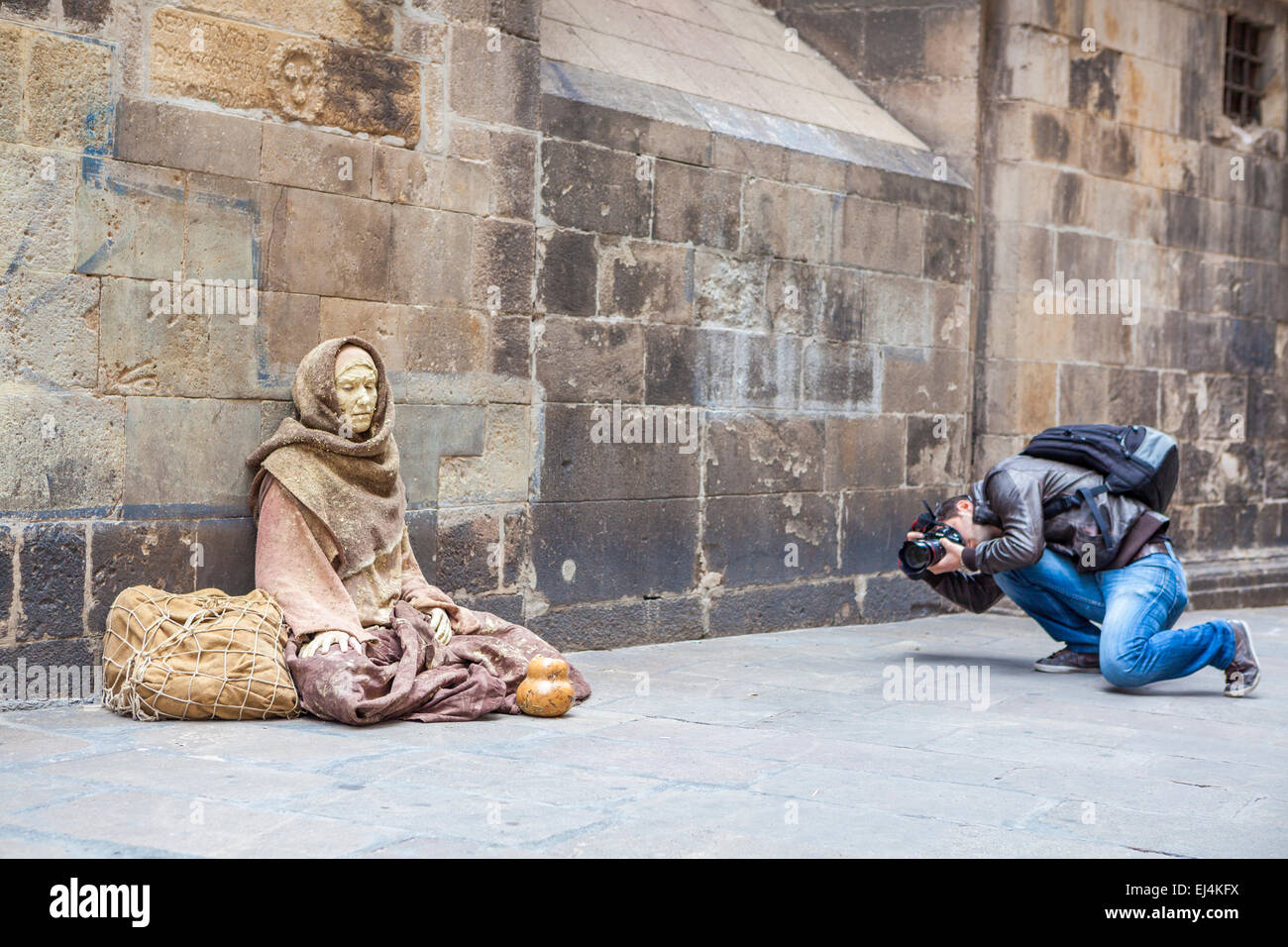 Street performance of human statues in the Cathedral of Barcelona