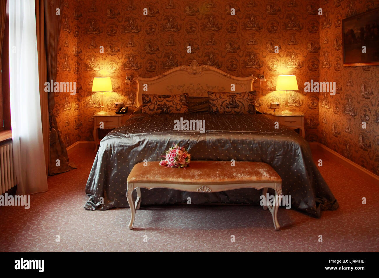 Nice bedroom with the big bed Stock Photo Alamy
