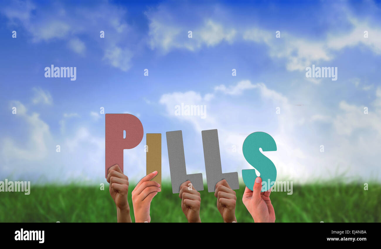 Composite image of hands holding up pills Stock Photo Alamy